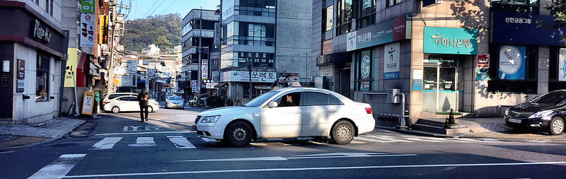 Taxi in the crosswalk